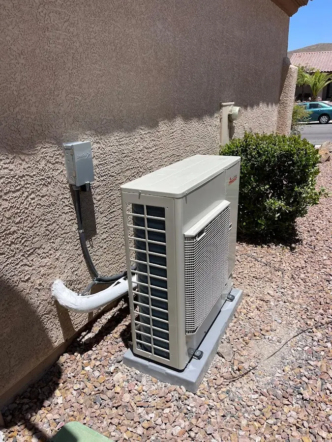 Residential air conditioning condenser unit in Greene